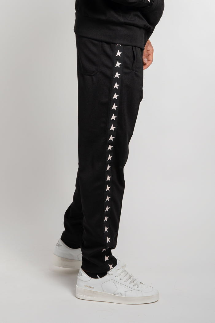 Pantalone jogging di colore nero con stelle bianche sui lati-2