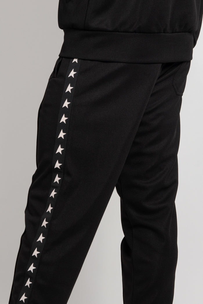Pantalone jogging di colore nero con stelle bianche sui lati-3