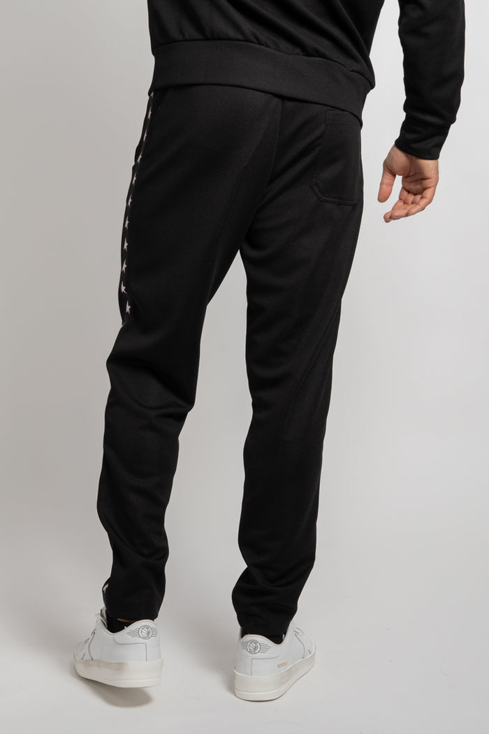 Pantalone jogging di colore nero con stelle bianche sui lati-4