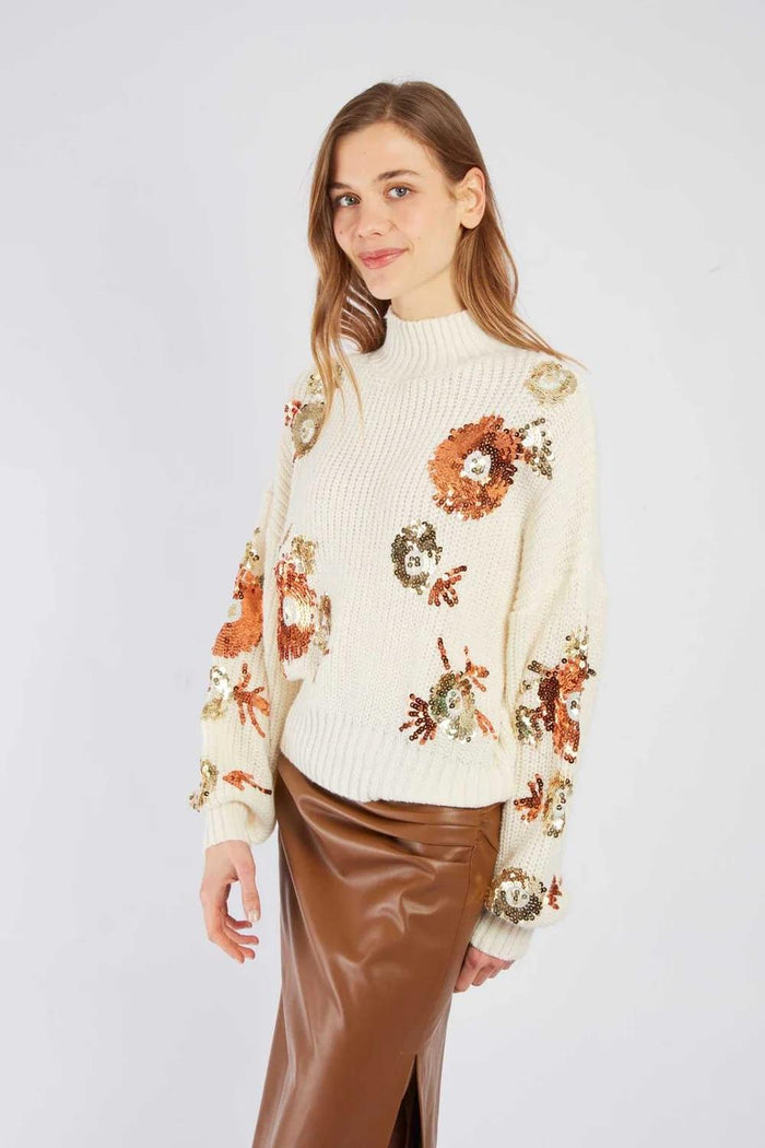 Maglione con paillettes